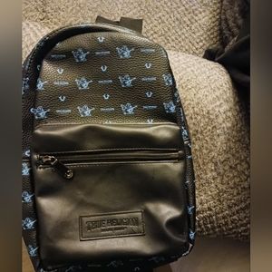 Used True Religion sling Black and blue